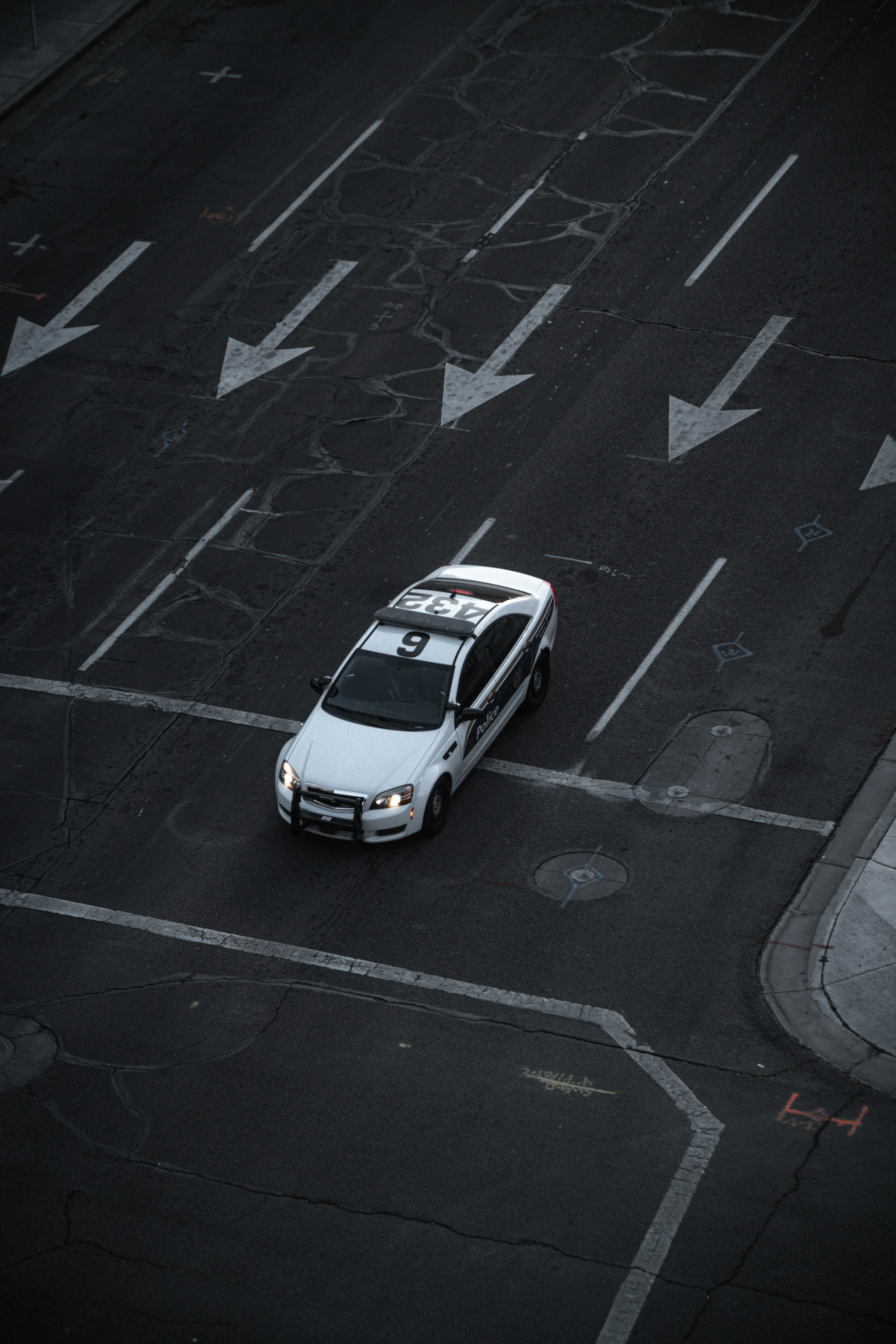 white and black car on road